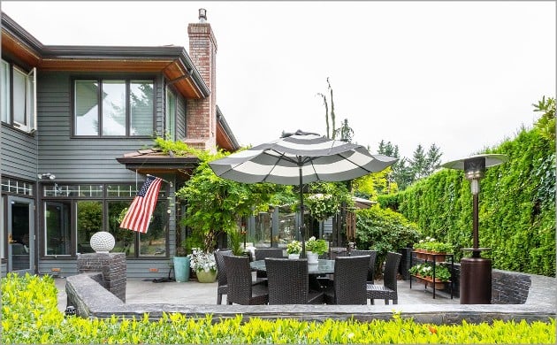 Patio with a  stamped concrete finish and a USA flag displayed