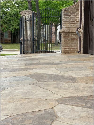 Authentic looking decorative concrete faux flagstone driveway