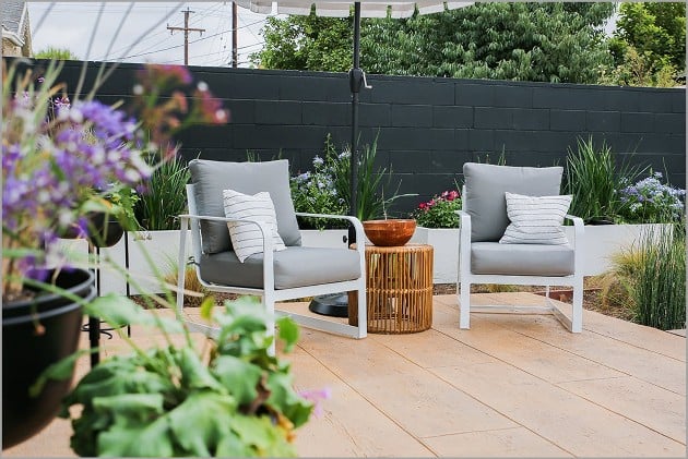 concrete overlay stamped to look like real wood on a patio 