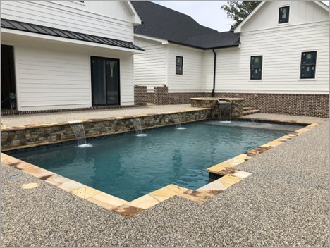 pebblekoat finish on a rectangle shaped pool deck