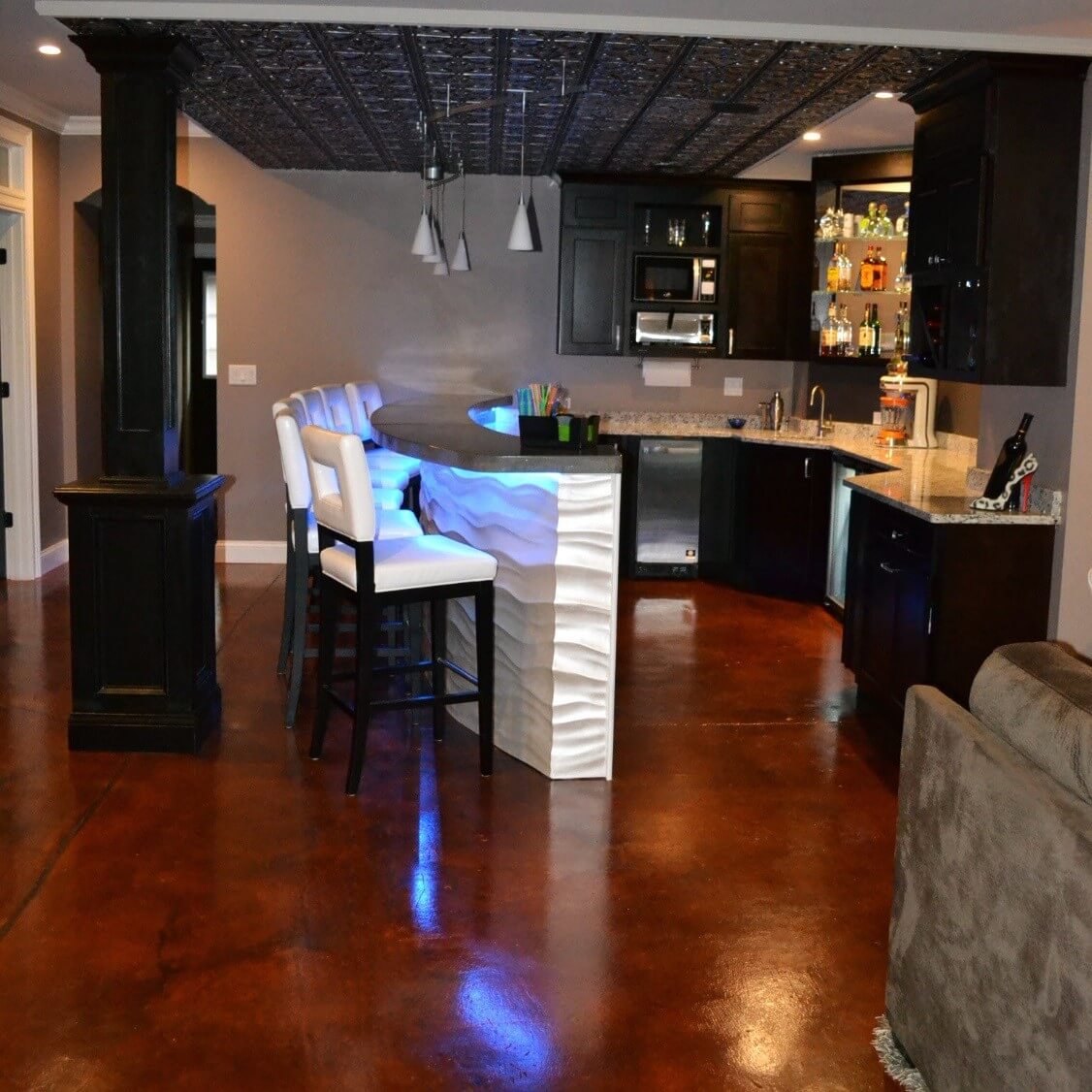 man-cave-basement-stained-decorative-concrete