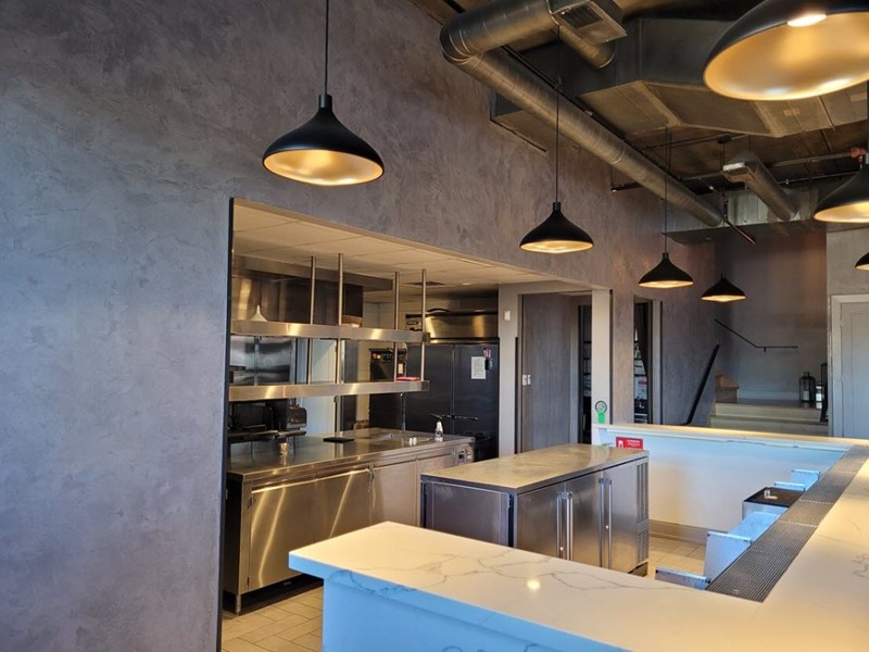 MarbleKoat walls make this commercial kitchen look very modern and industrial chic