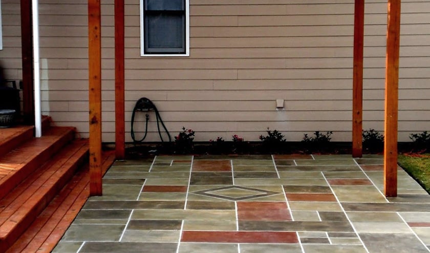 Decorative Hand-Cut Colorful Overlay on Patio Decorative Hand-Cut Colorful Overlay on Patio