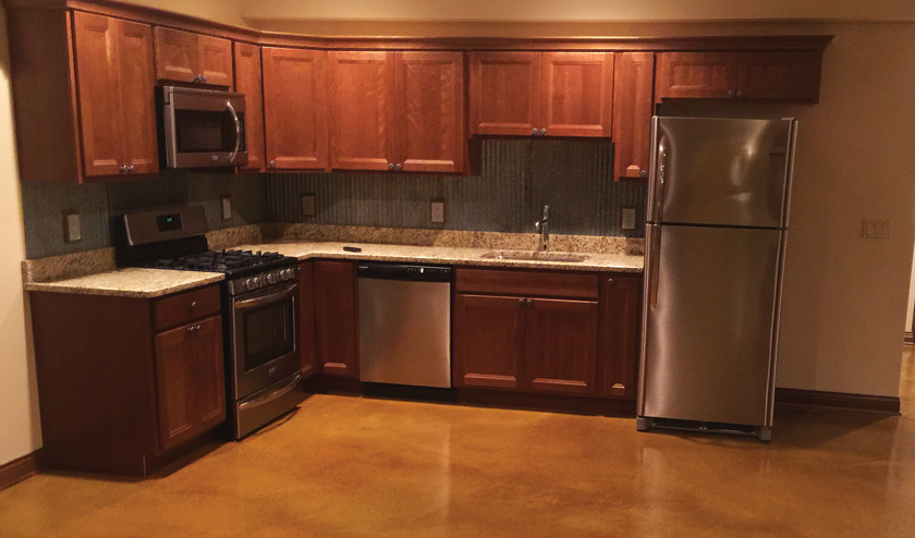 Stained Kitchen Concrete Floor