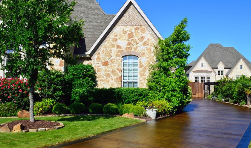 Stained Concrete Driveway with Contrasting Color Border