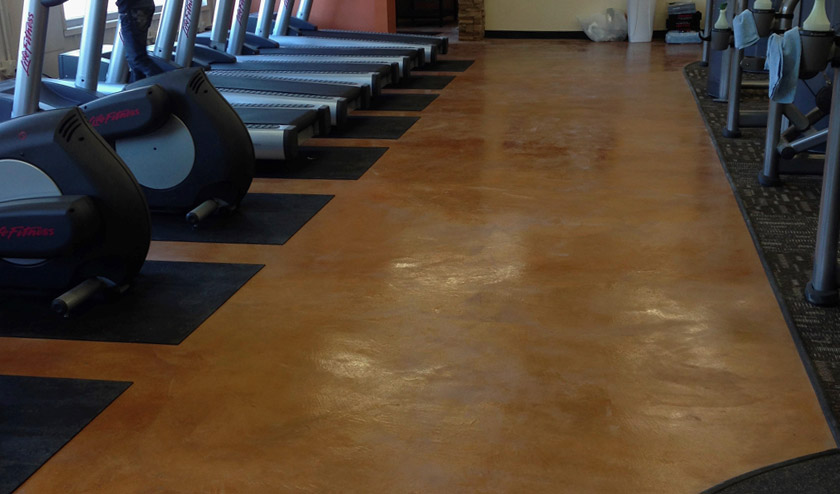 Stained commercial interior Gym in light brown