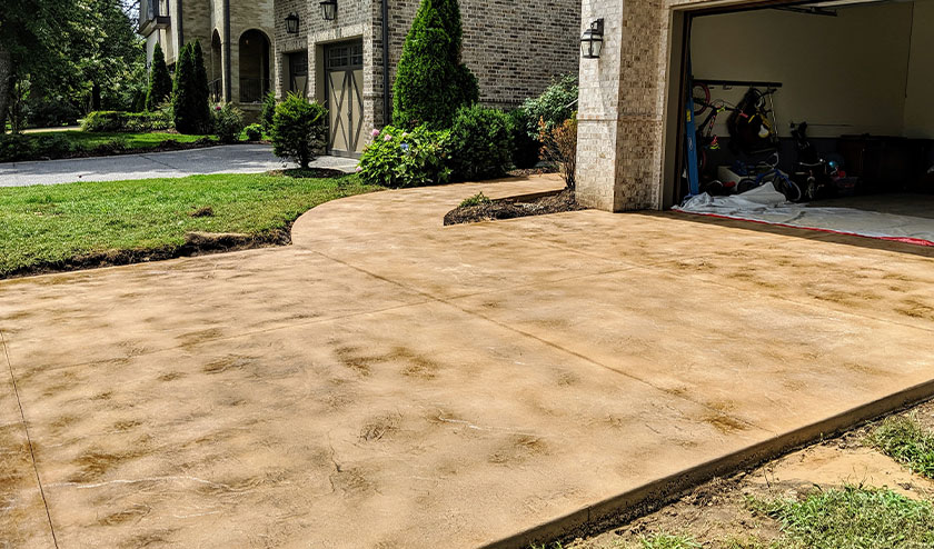 Stamped driveway floor with Sandstone