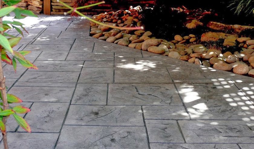 Stamped-Patio-with-Rocks-Gray